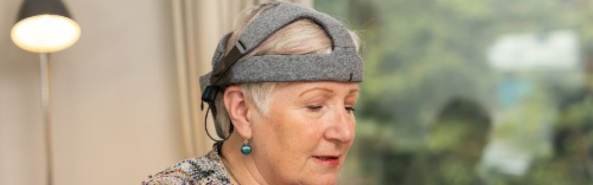 image of woman wearing fastball headset